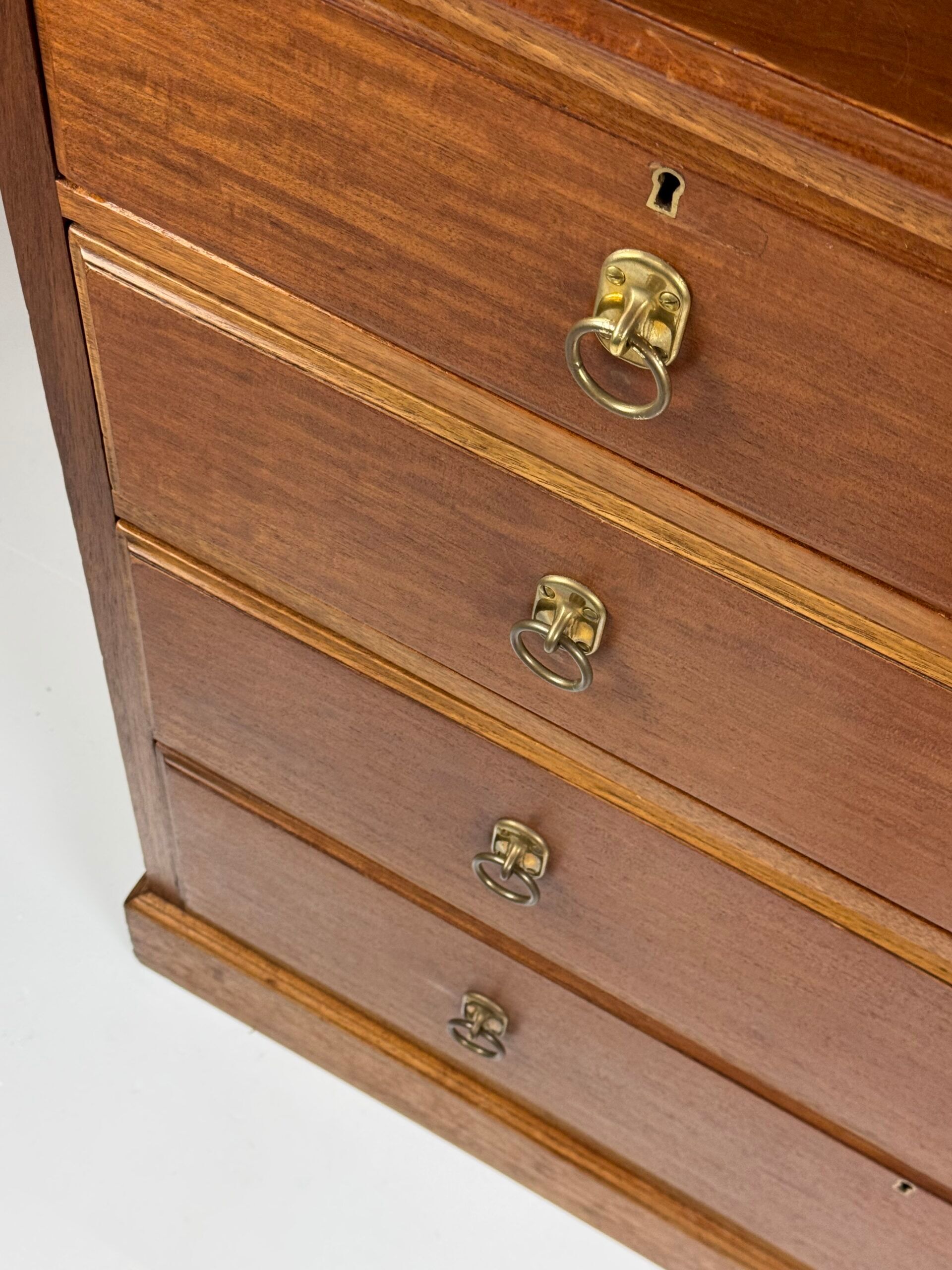 Harrods mahogany chest of drawers