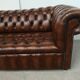 Light brown leather chesterfield sofa upholstered