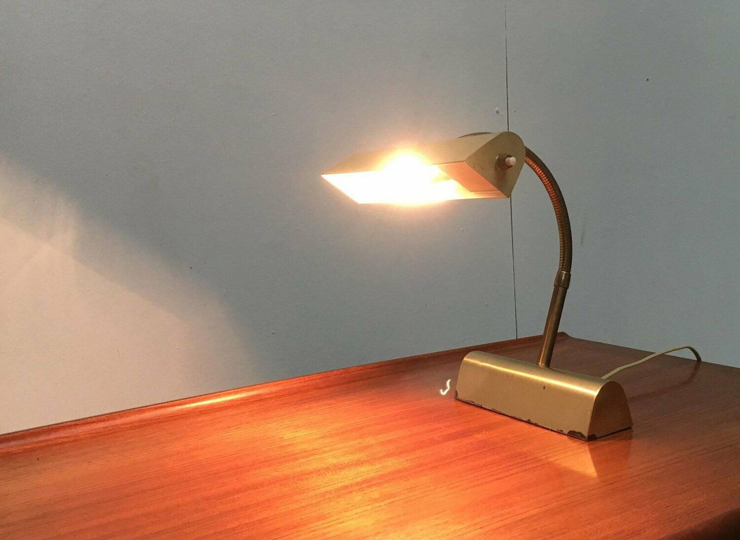 Mid-century brass swan neck table lamp in Hollywood Regency style from the 1960s.