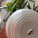 Translucent glass saucer suspension