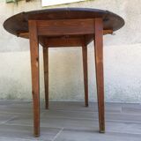 Round table at 2 vintage wood rabats