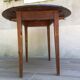 Table ronde à 2 rabats en bois vintage