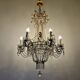Antique crystal chandelier with floral details 1910