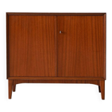 Storage cabinet with hinged doors