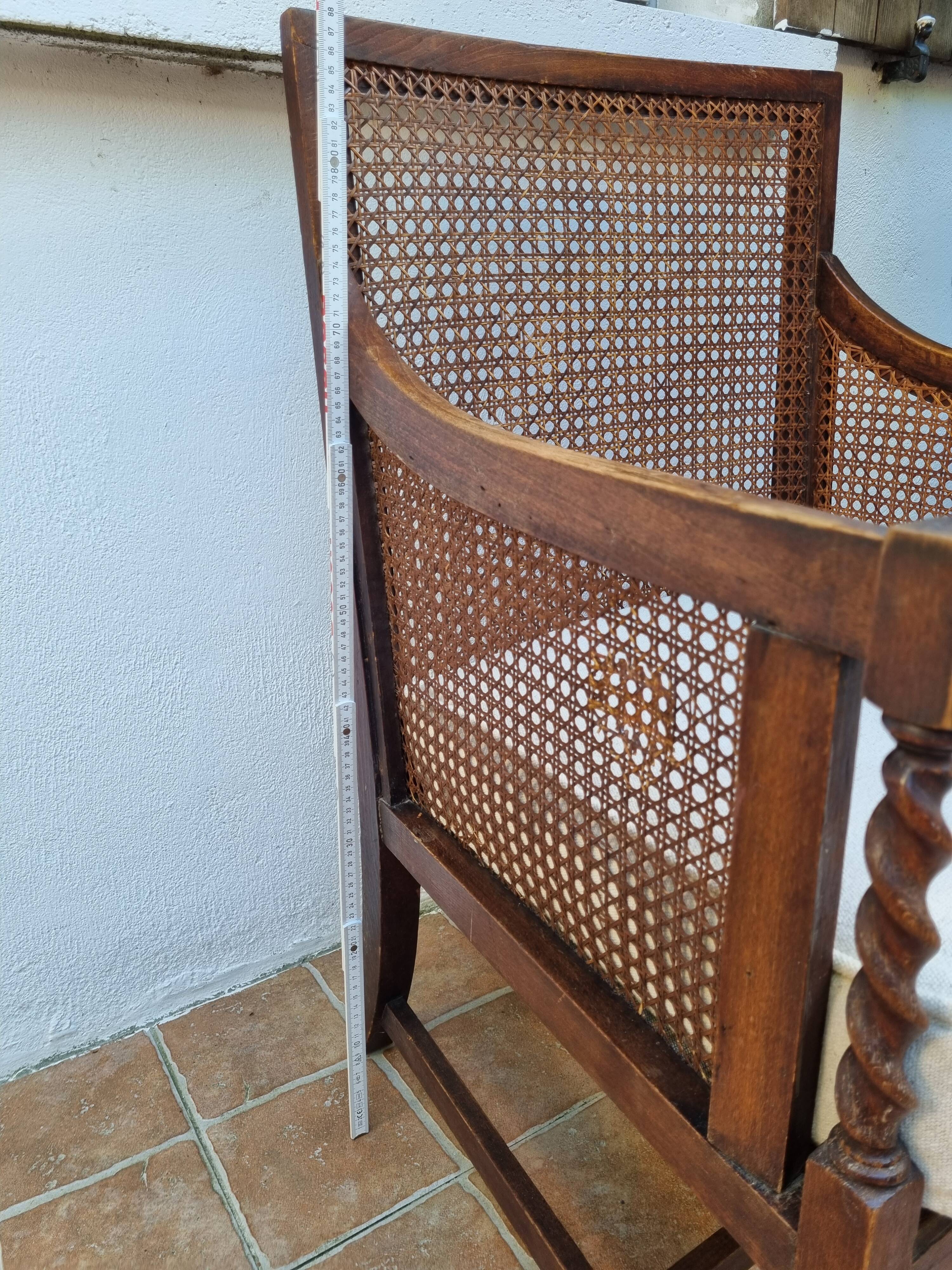 Vintage armchair in turned wood and cane, upholstered seat, 1940s