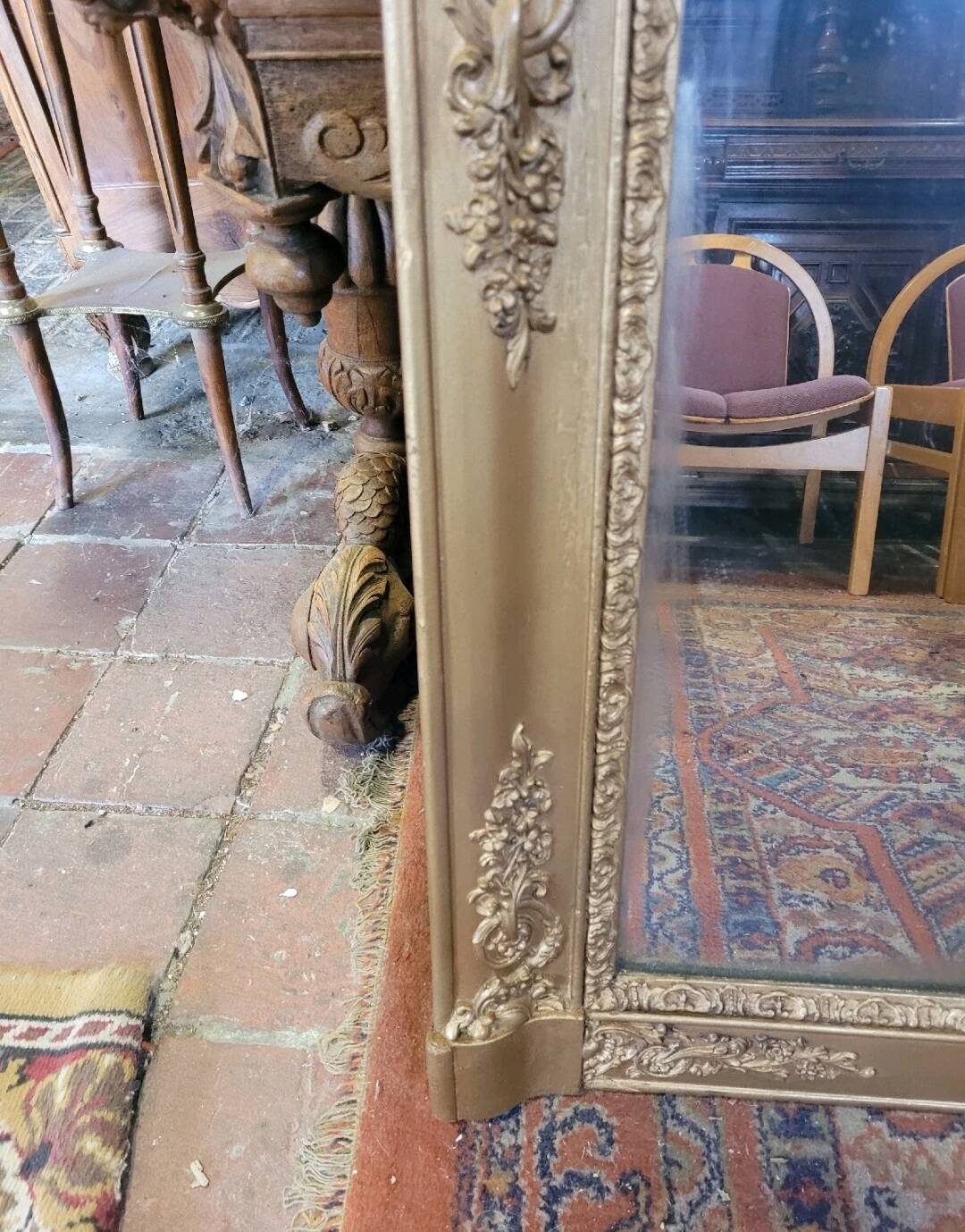Antique gilded mirror from the 19th century, mercury mirror.