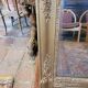 Antique gilded mirror from the 19th century, mercury mirror.