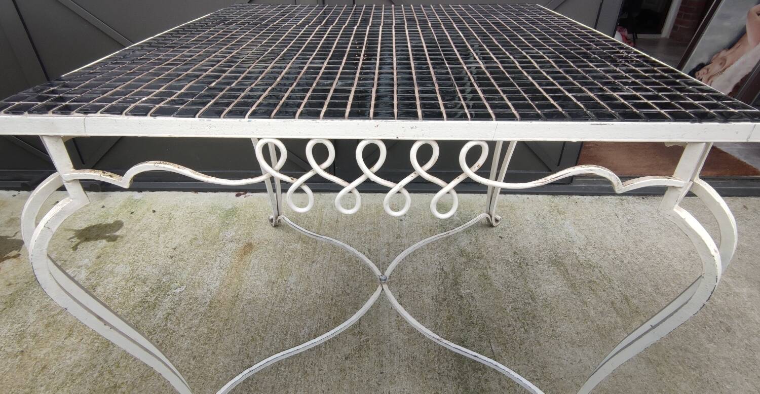 Old wrought iron table / ceramic tile top