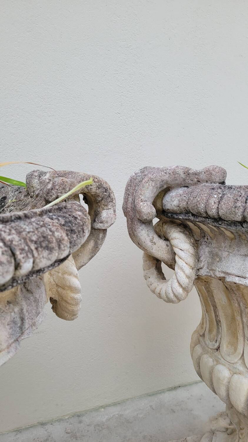 Pair of planter vases decorated with faces in reconstituted stone 1950s