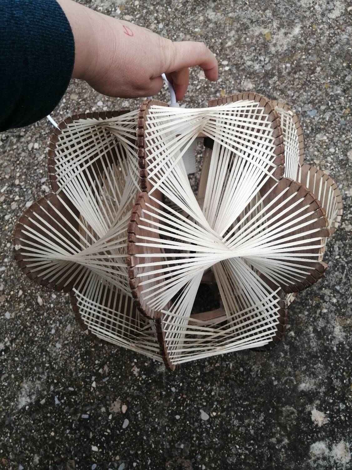 Pair of vintage wooden and rattan straw pendant lights.
