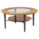 Sculptural coffee table in walnut and glass, Italy, 1950.