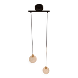 Two-light pendant in a cascade of cut crystal globe