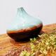 Turquoise and brown ceramic vase