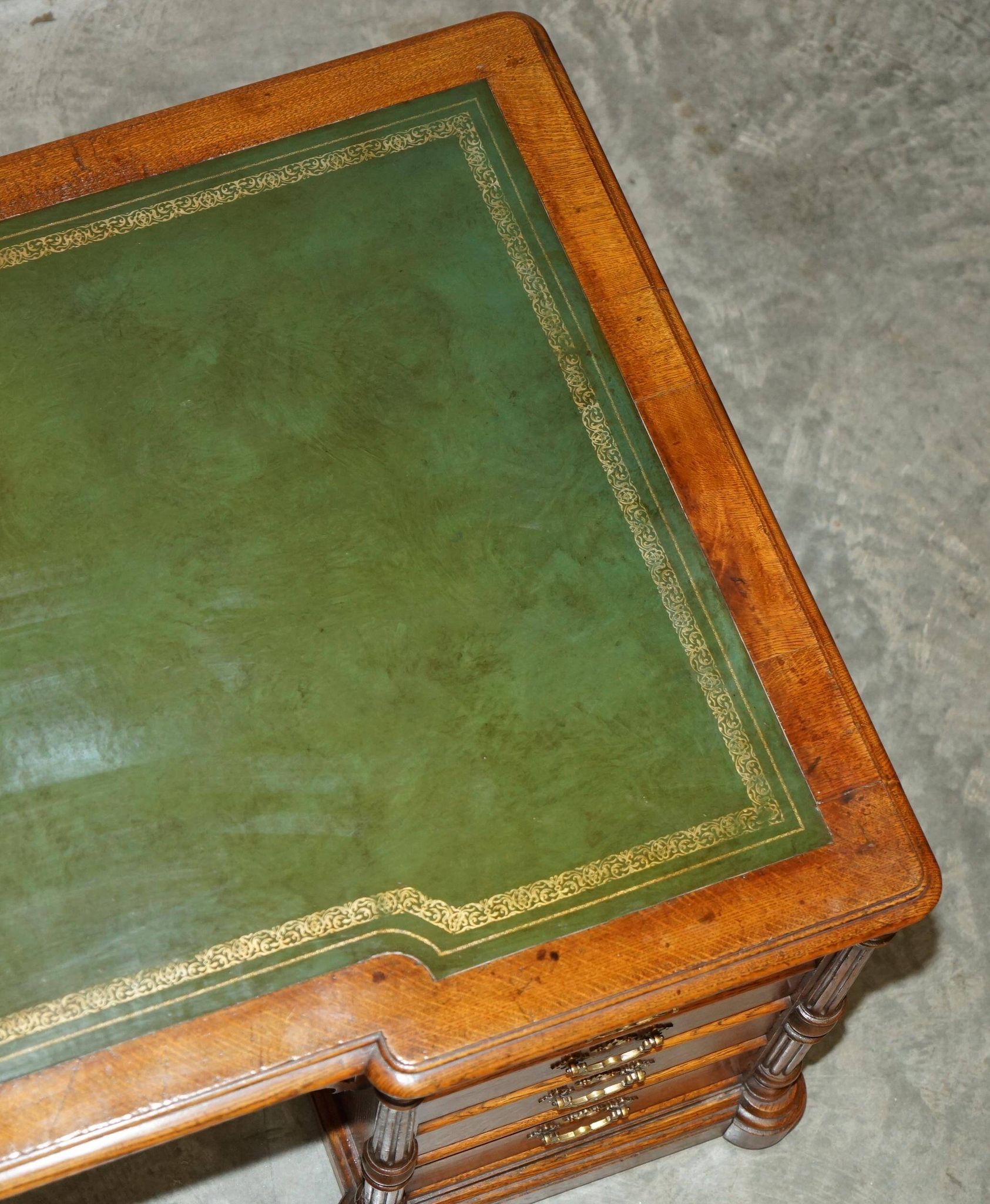 Antique double-sided desk C Hindley & Son in oak and leather