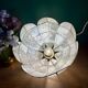 Vintage pendant light in mother-of-pearl and brass.