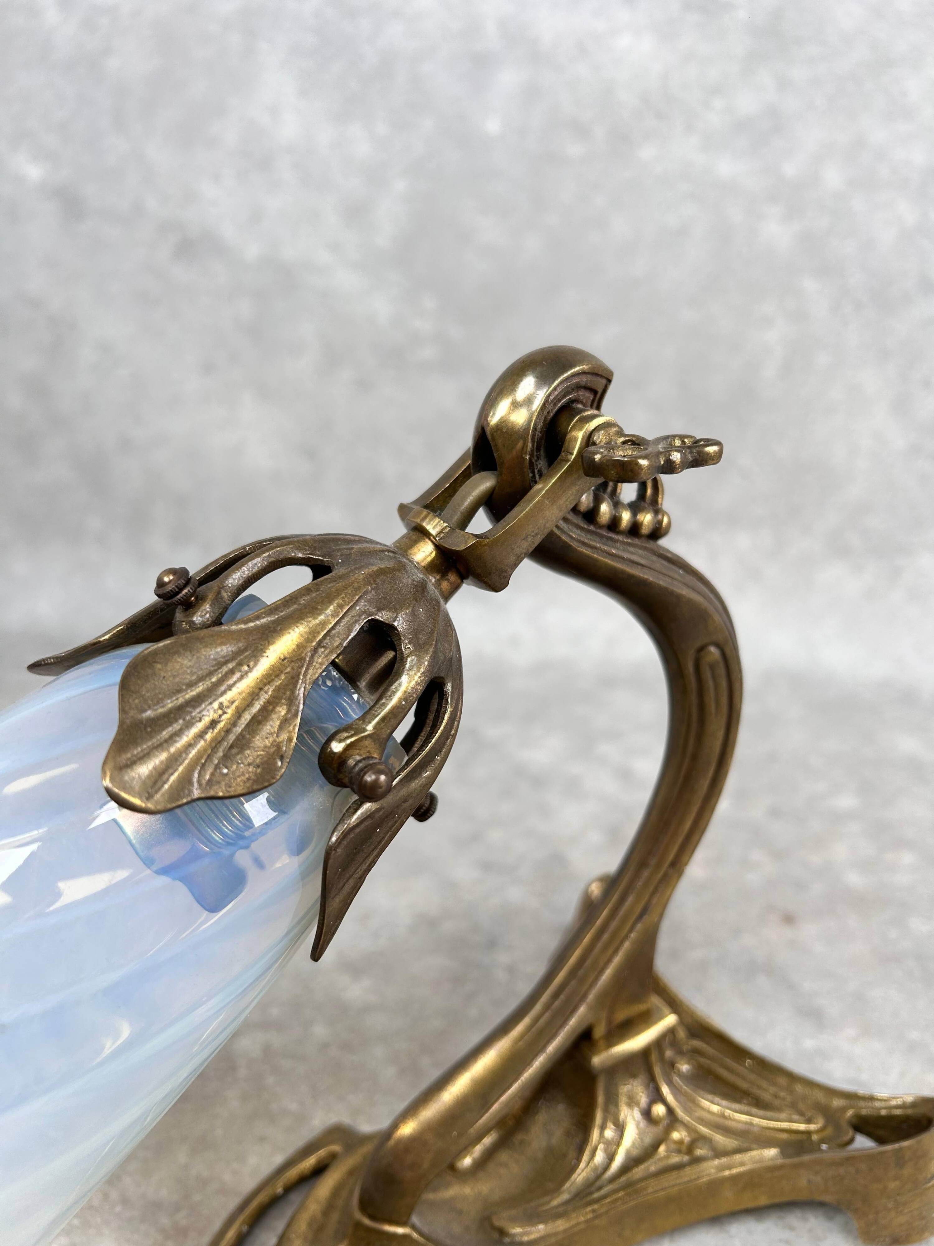 Art Nouveau wall sconces with opalescent iridescent glass