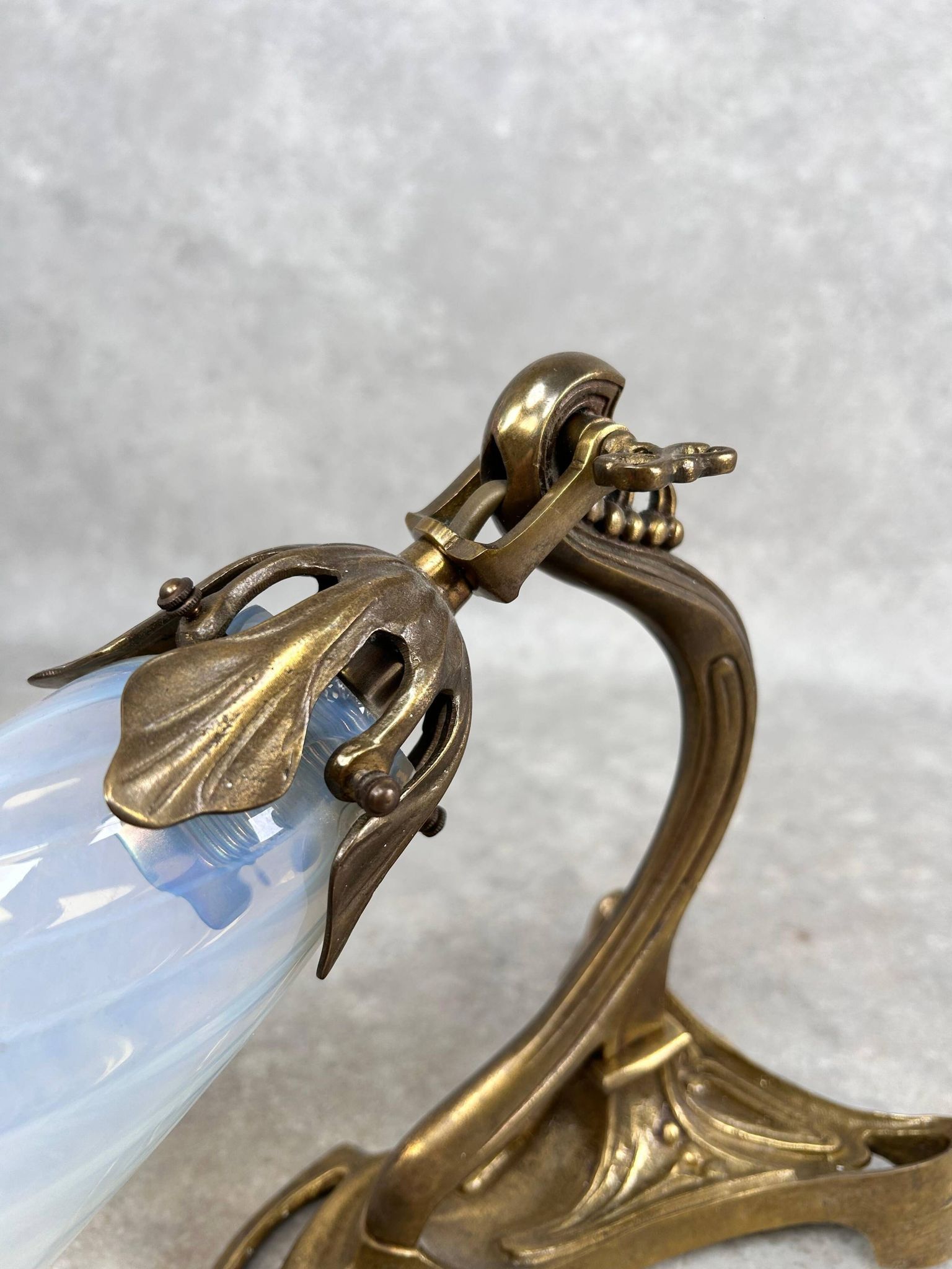 Art Nouveau wall sconces with opalescent iridescent glass