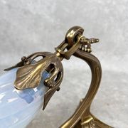 Art Nouveau wall sconces with opalescent iridescent glass
