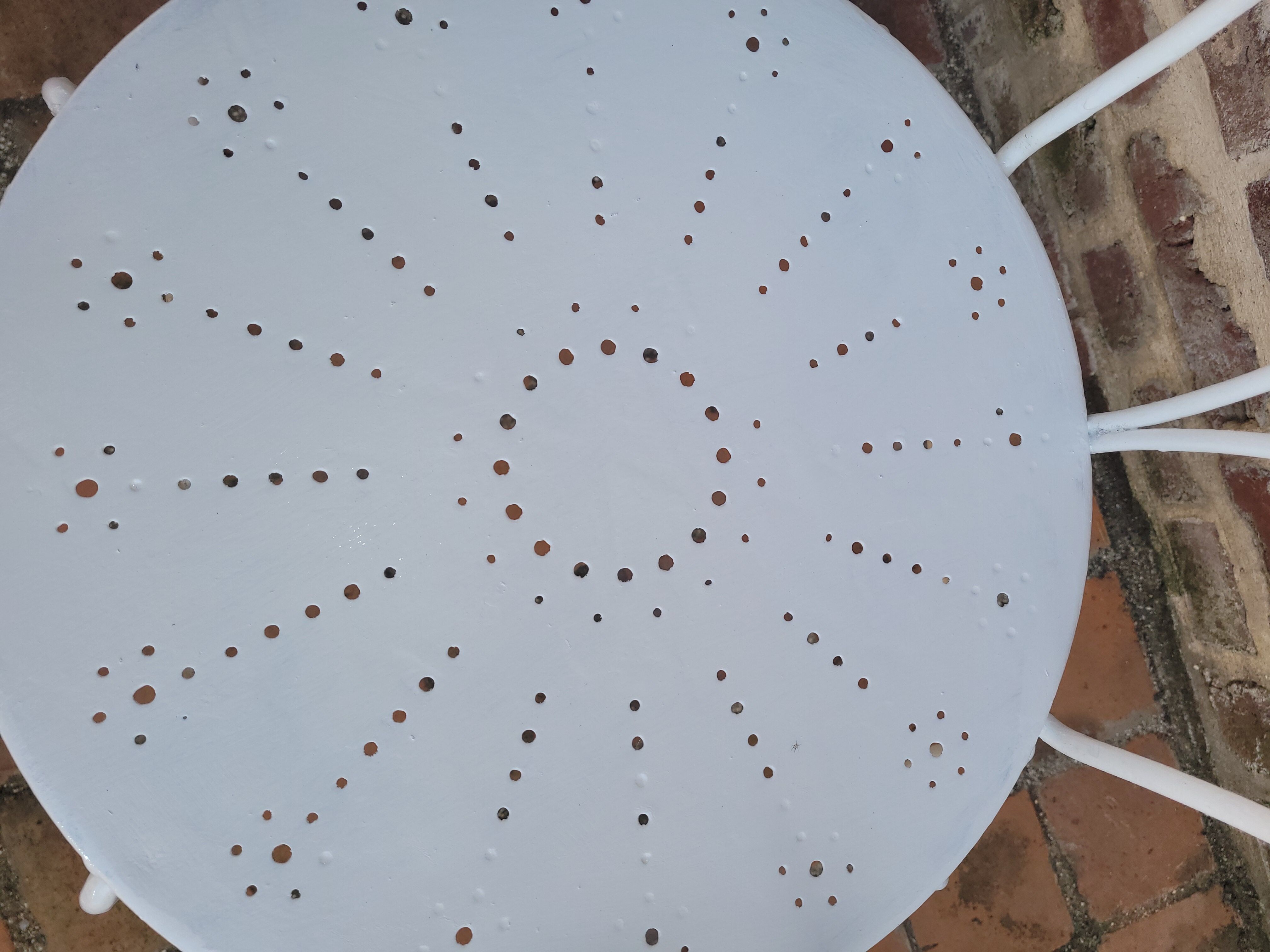 Wrought iron garden armchair