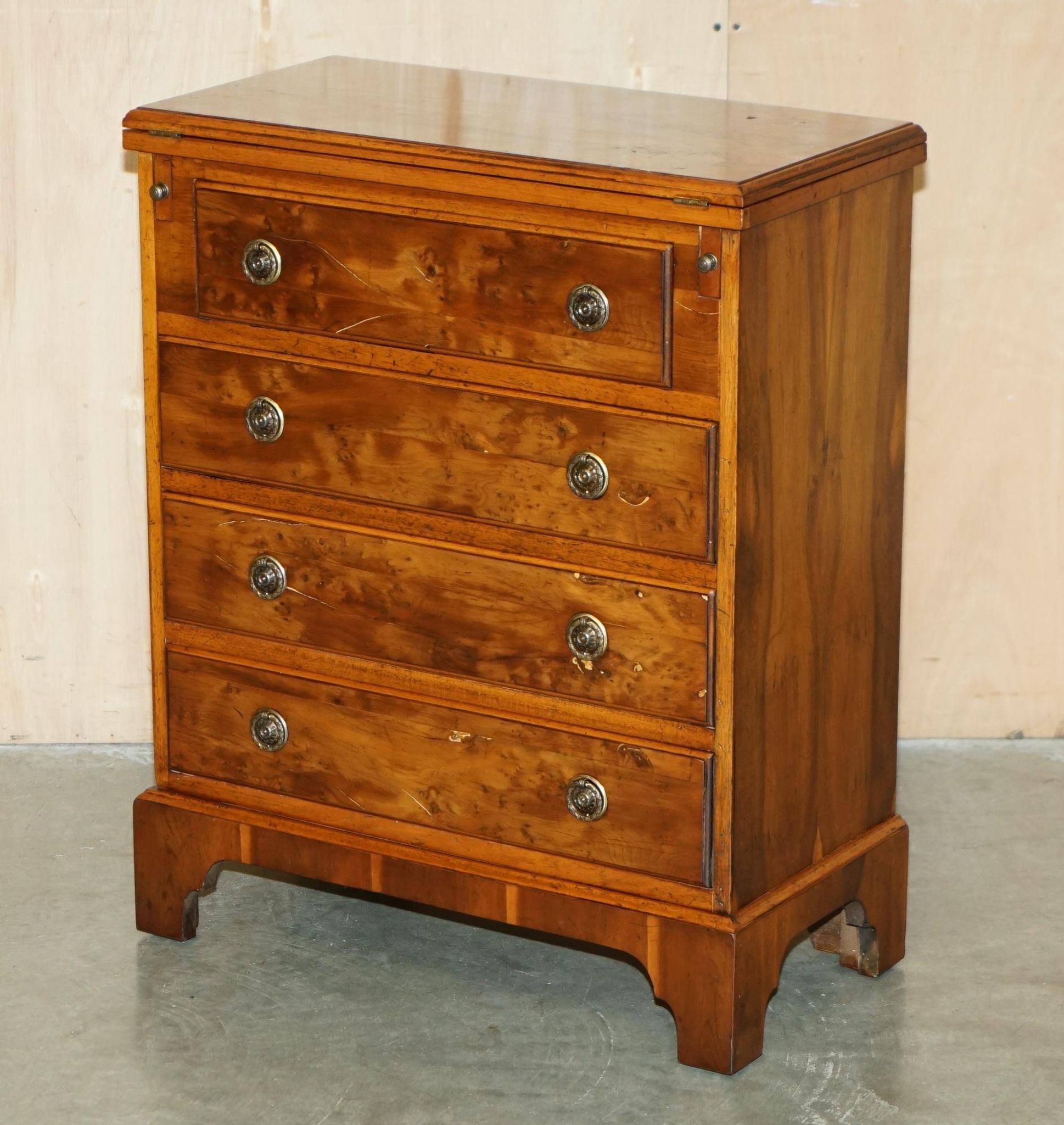 Vintage walnut commode with sliding top in Butler style.