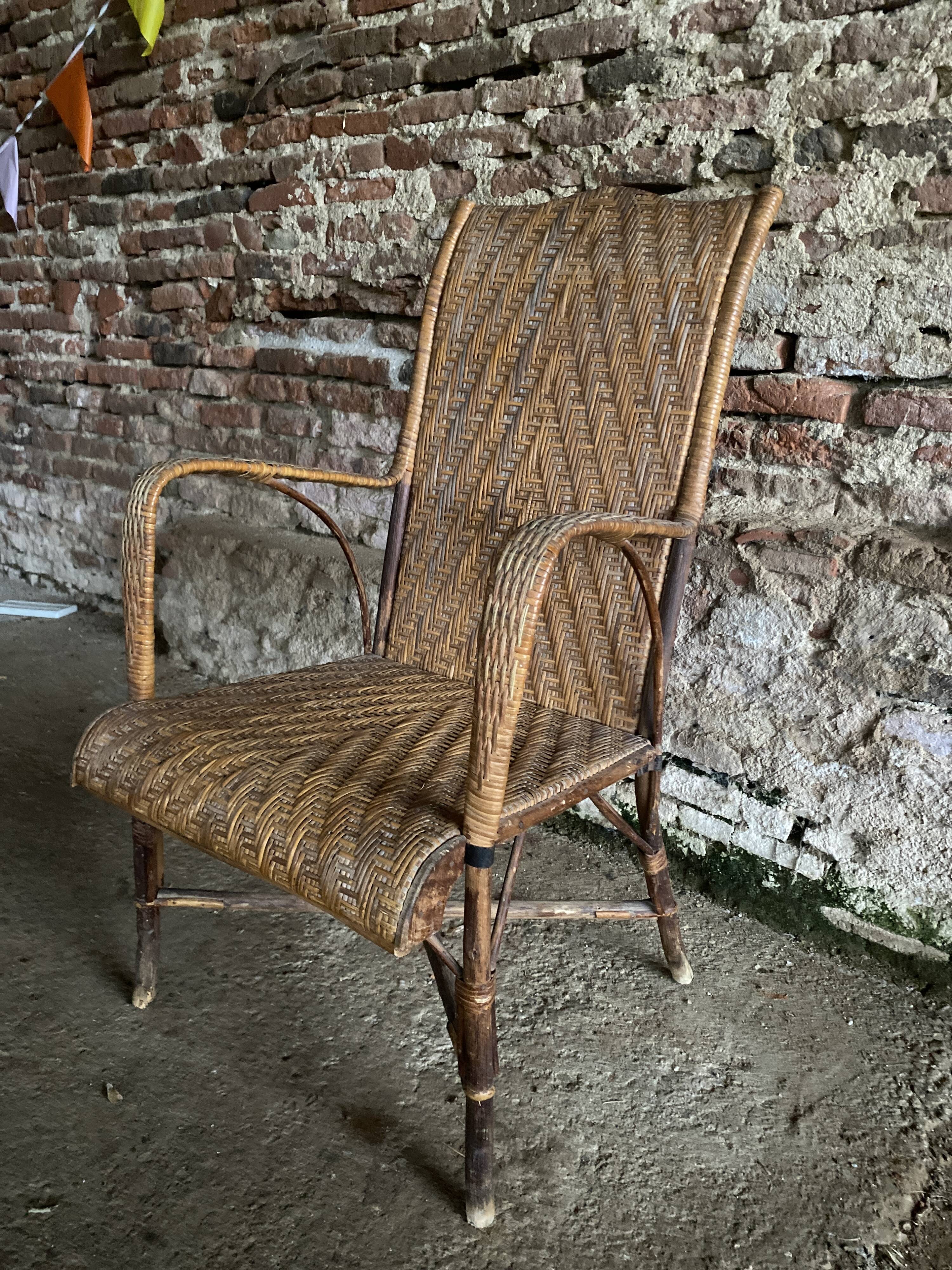Braided rattan armchair