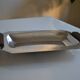 Art Deco serving dish in chrome metal with ebony handles.