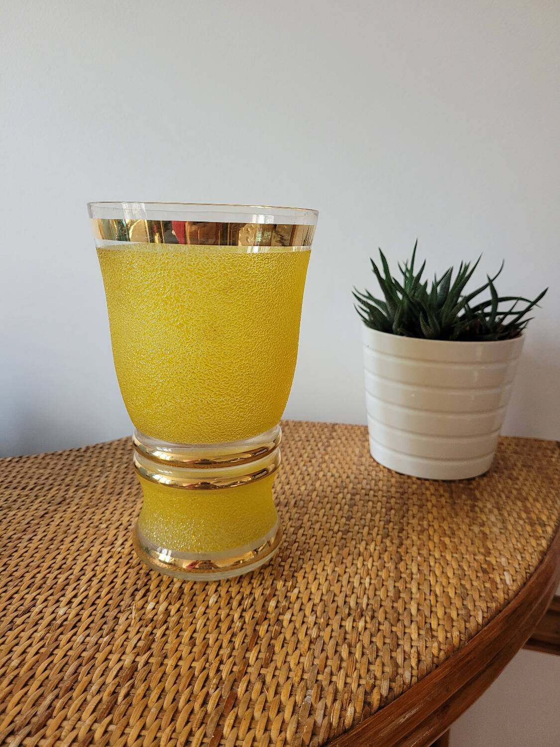 Yellow and gold granite vase