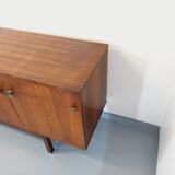 Vintage Scandinavian style row in rosewood and brass from the 60s