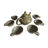 Tea service in varnished sandstone