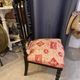 Fireplace or changing chair period 1900 in black lacquered wood and printed fabric