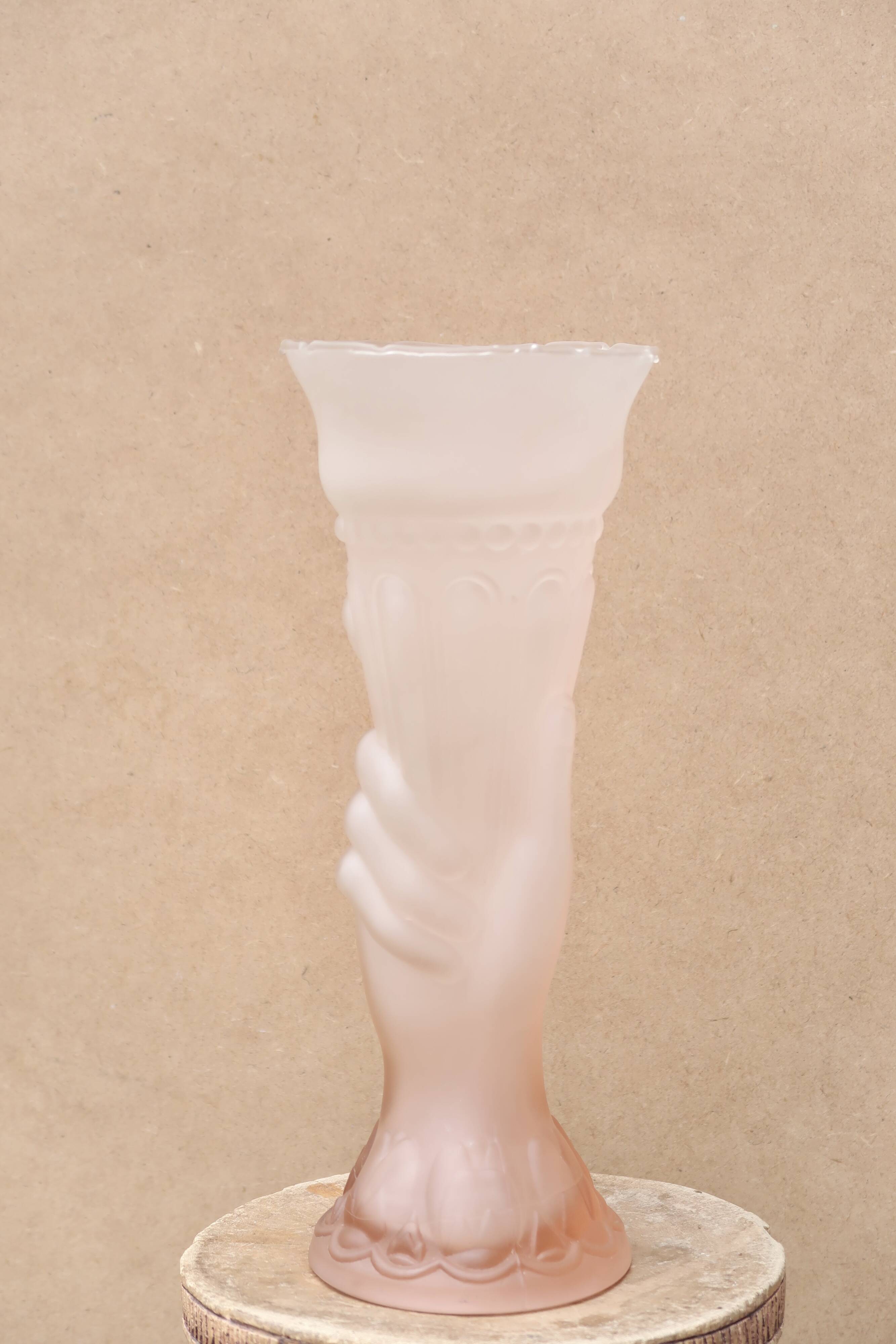 Pale pink glass vase decorated with a hand, 1960s