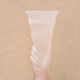 Pale pink glass vase decorated with a hand, 1960s