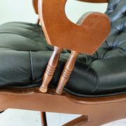 Black leather rocking Chesterfield armchair