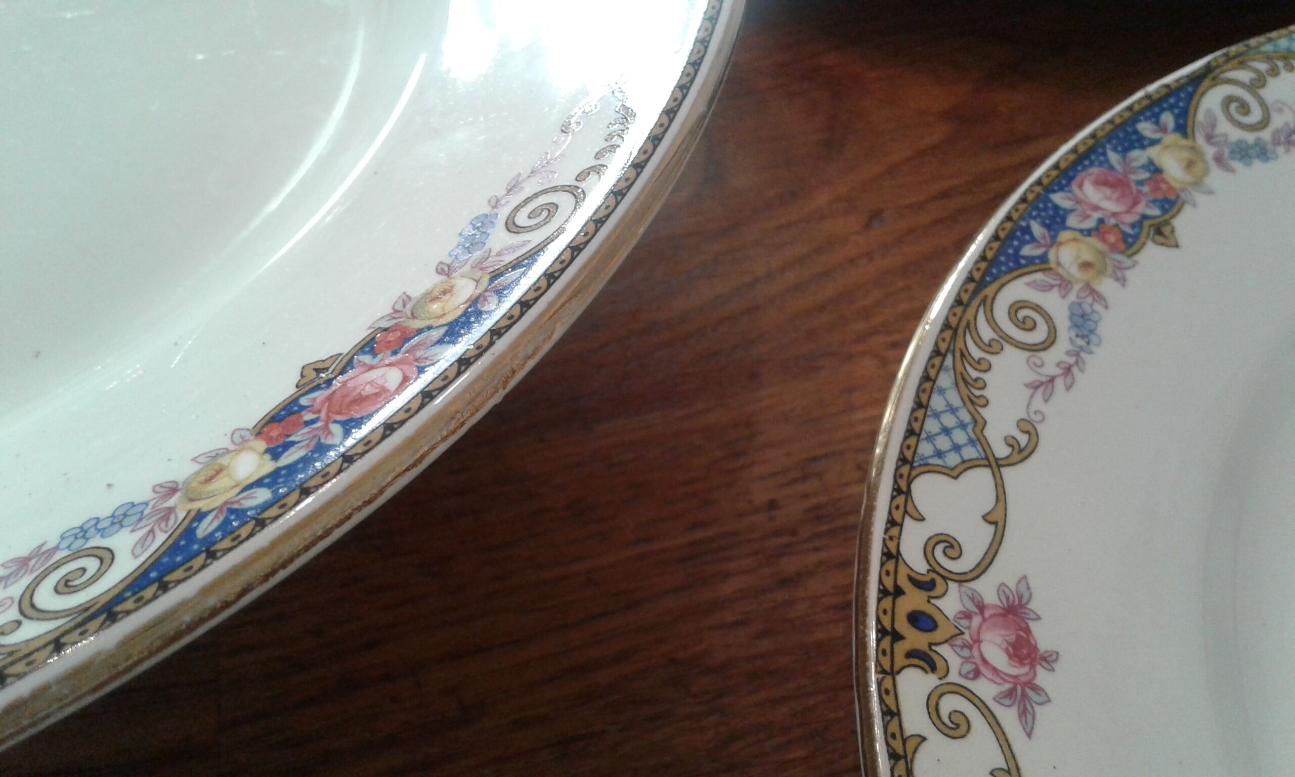 9 dessert plates and heel plate. sarreguemines,flower decirs