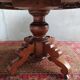 English oval table with 19th century mahogany extensions