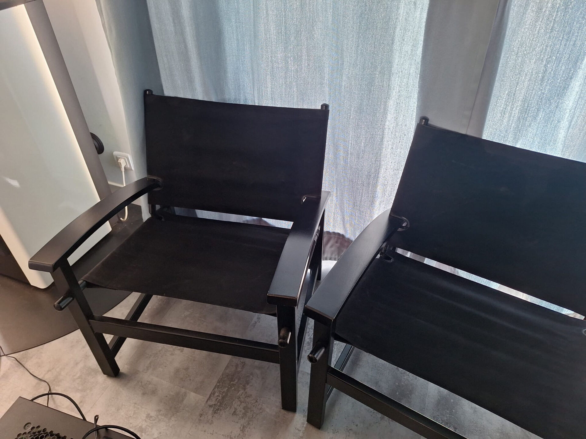 Pair of vintage "safari" style armchairs published by Hyllinge Møbler.