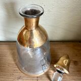 Glass and gilded bottle