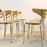Thonet dining chairs stacked in chrome and beech