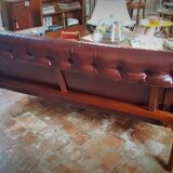 Scandinavian couch in the 60s in teak and skai