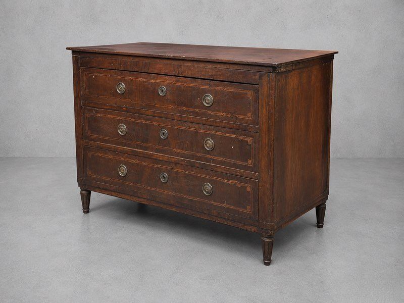 Antique commode in Louis XVI style