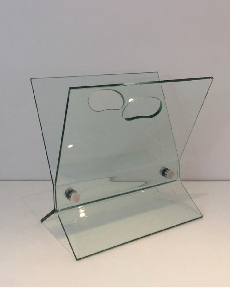 Design magazine holders in glass and brushed steel
