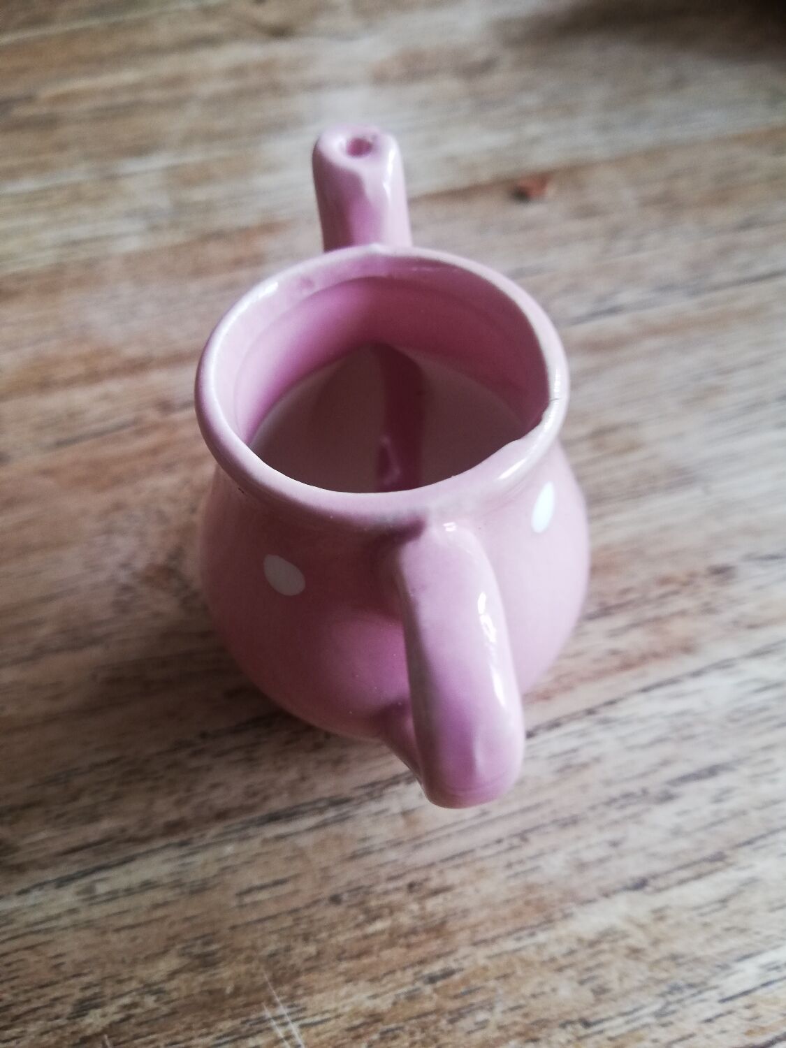 Miniature pink pitcher with white polka dots for play kitchen or dollhouse