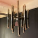 Scoliari chandelier with 18 bright nickel dots distributed by Boulanger