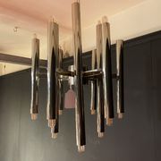 Scoliari chandelier with 18 bright nickel dots distributed by Boulanger