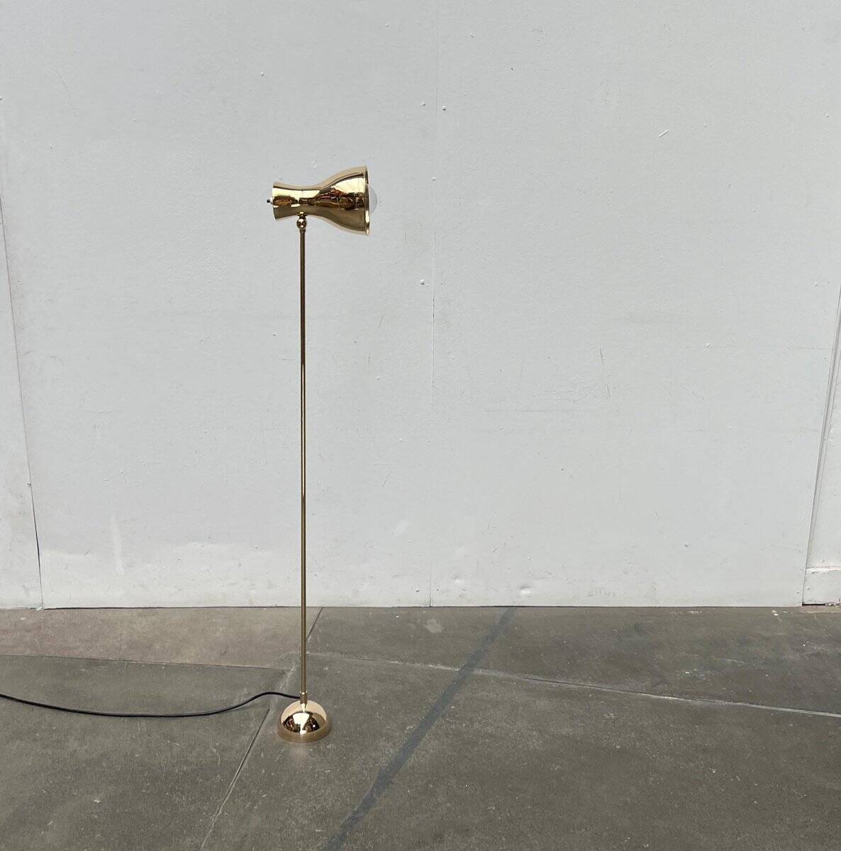 Minimalist brass floor lamp from the mid-century by Dieter Schulz for Wohnbedarf Ag, 1950s.
