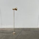 Minimalist brass floor lamp from the mid-century by Dieter Schulz for Wohnbedarf Ag, 1950s.