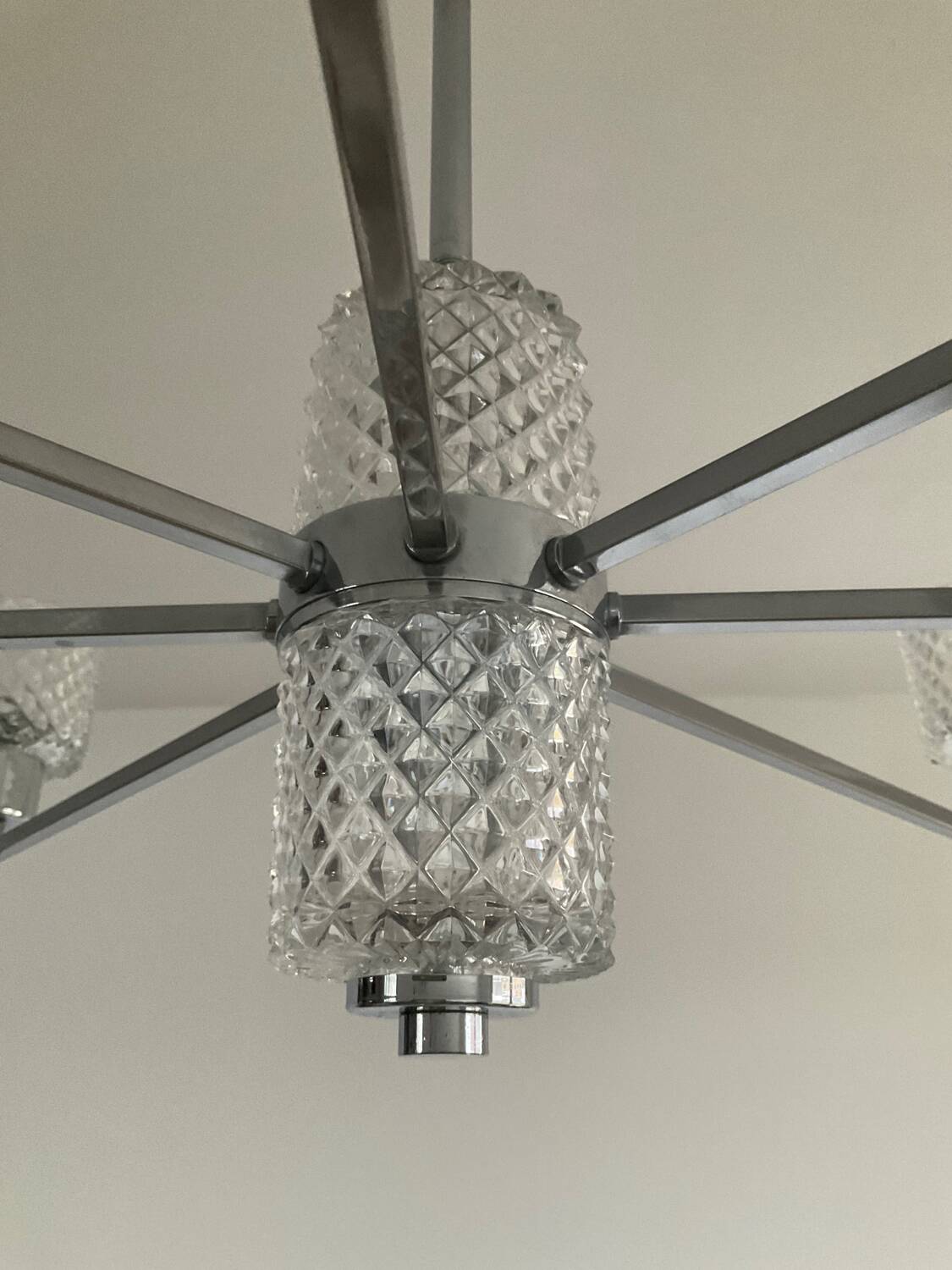 Vintage Italian chandelier from the 60s in chromed metal and glass