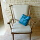 Fauteuil en bois dossier éventail baumann