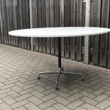 Round dining table by Charles & Ray Eames for Vitra 1980