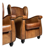 Set of 2 sheepskin club armchairs